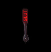 Experience new heights of pleasure with our vegan leather slap paddle. Perfect for BDSM play, this paddle delivers sensual or harder spankings with ease.