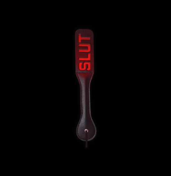 Experience new heights of pleasure with our vegan leather slap paddle. Perfect for BDSM play, this paddle delivers sensual or harder spankings with ease.