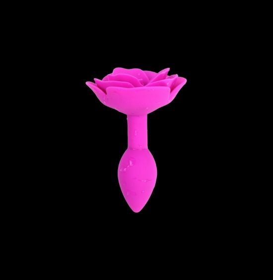 Explore new sensations with our Feeling Rosey anal plug. This elegant rose bud plug is crafted from smooth and firm silicone, and is designed to give your backdoor the ultimate sensation. With a tapered width of up to 1.2", it's the perfect size to experience the full pleasure of anal play. Made of 100% medical-grade silicone, this plug is body-safe, easy to clean, and waterproof. Shown in pink